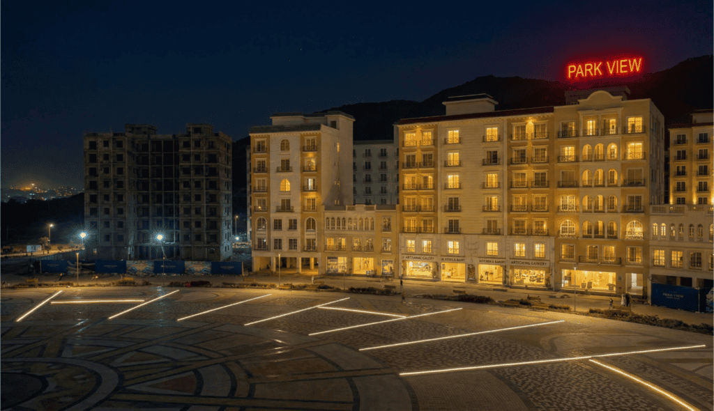 Night view of a modern city with illuminated buildings and "Park View" sign in red neon.