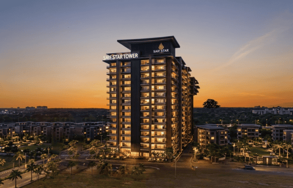 High-rise building at sunset with "Safe Start Tower" signage.
