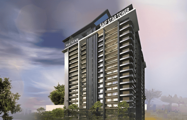 Modern high-rise building with sleek design and glass facade.